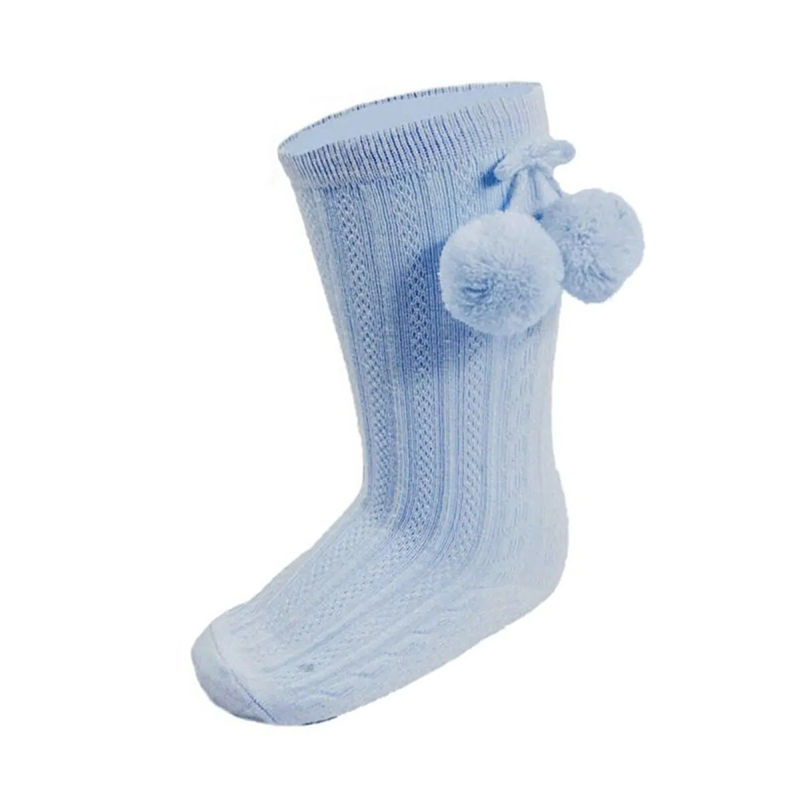 Babystrumpor med pälsbollsdekoration